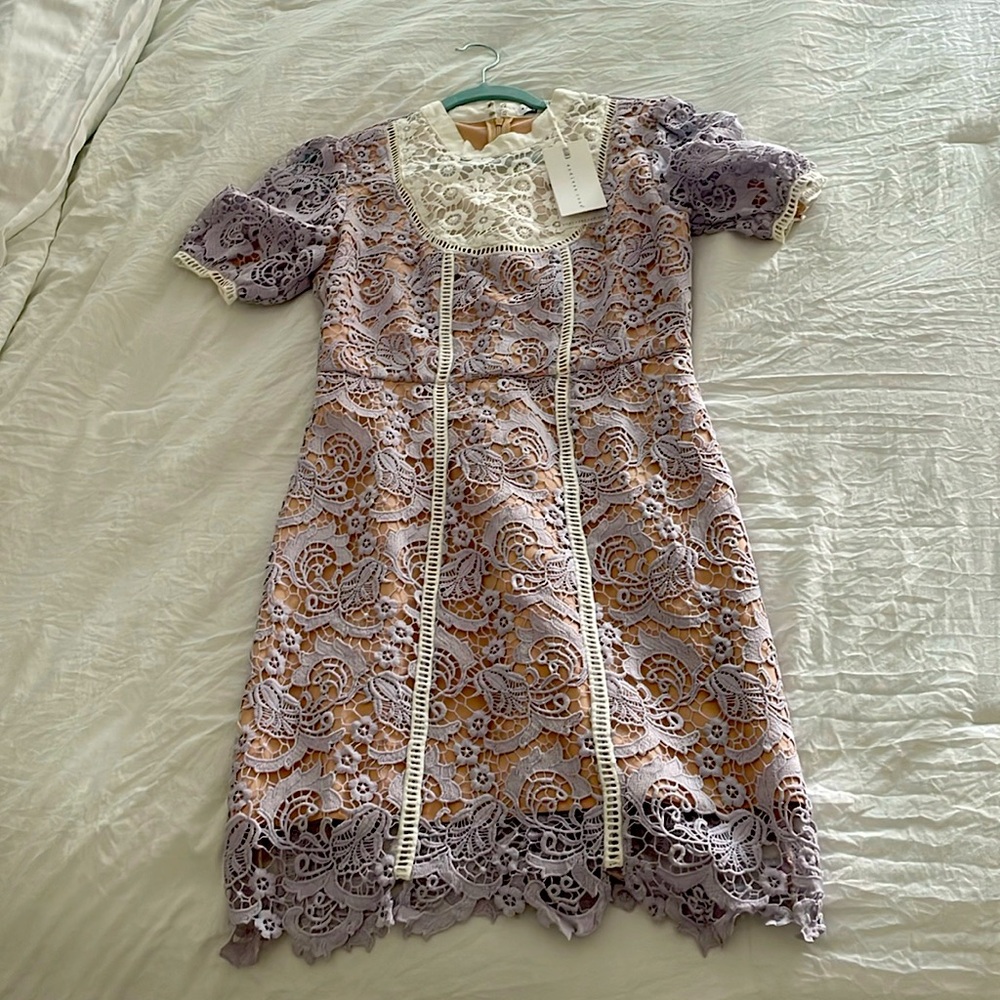 Embroidered dress by Endless Rose. Medium Size. Condition: Unworn with tag.